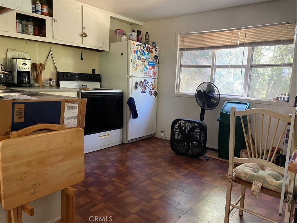 7360 Lassen Street Nice, CA 95464 - Photo 6 of 13 a view of workspace with furniture and window