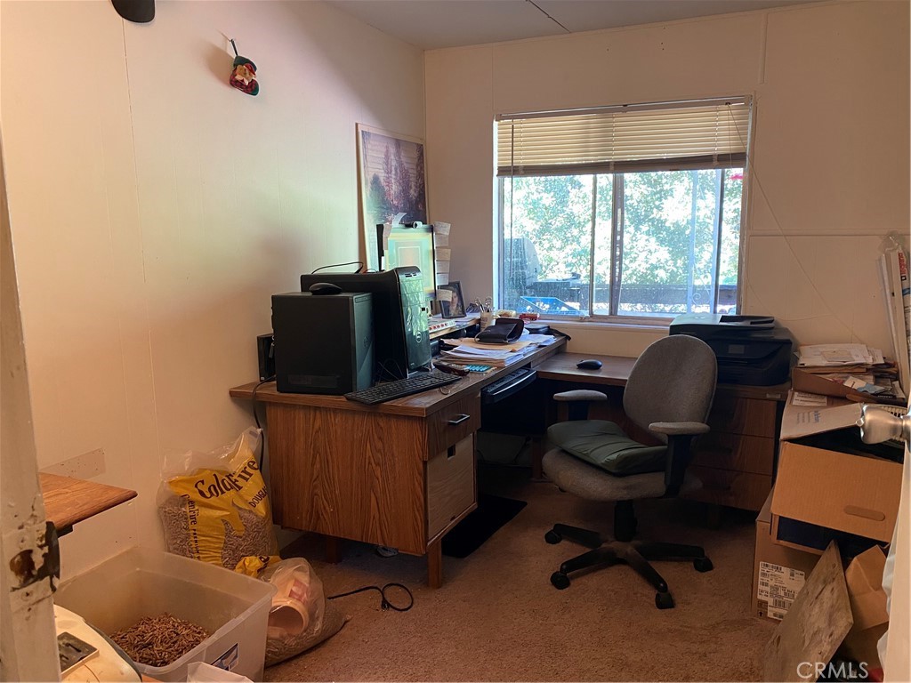 7360 Lassen Street Nice, CA 95464 - Photo 9 of 13 a room with furniture and a window