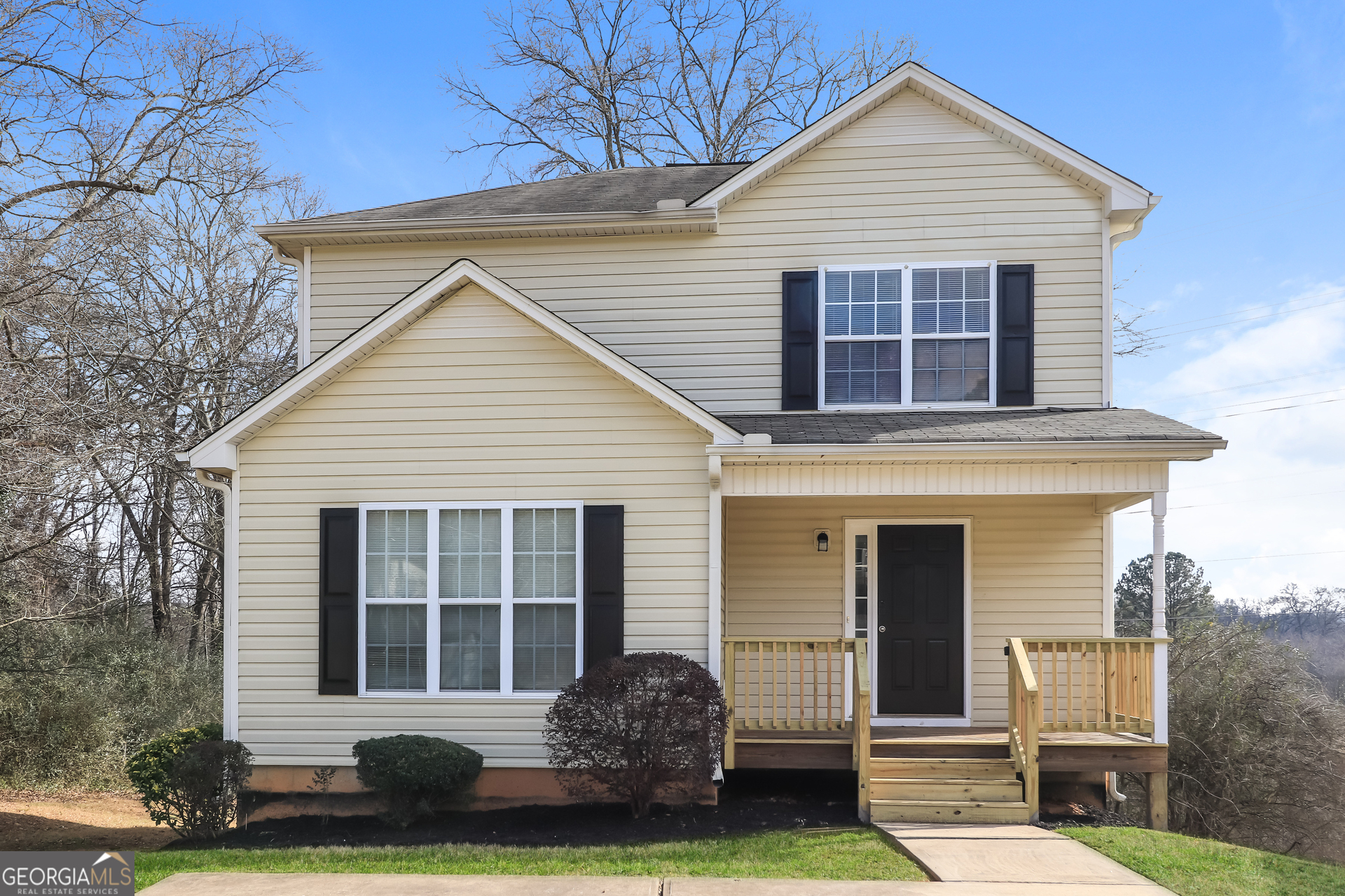 2 Wingfoot Trail Cartersville, GA 30120 - Photo 1 of 18 a front view of a house with garden