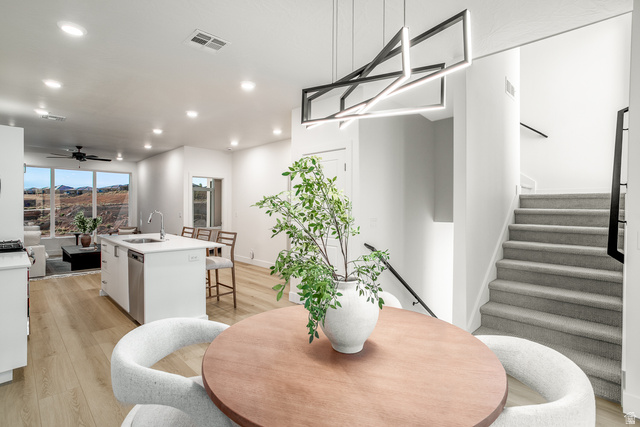 2768 Becco Trail, Unit 63 St. George, UT 84770 - Photo 8 of 27 Dining space with ceiling fan, recessed lighting, light wood-type flooring, and a mountain view