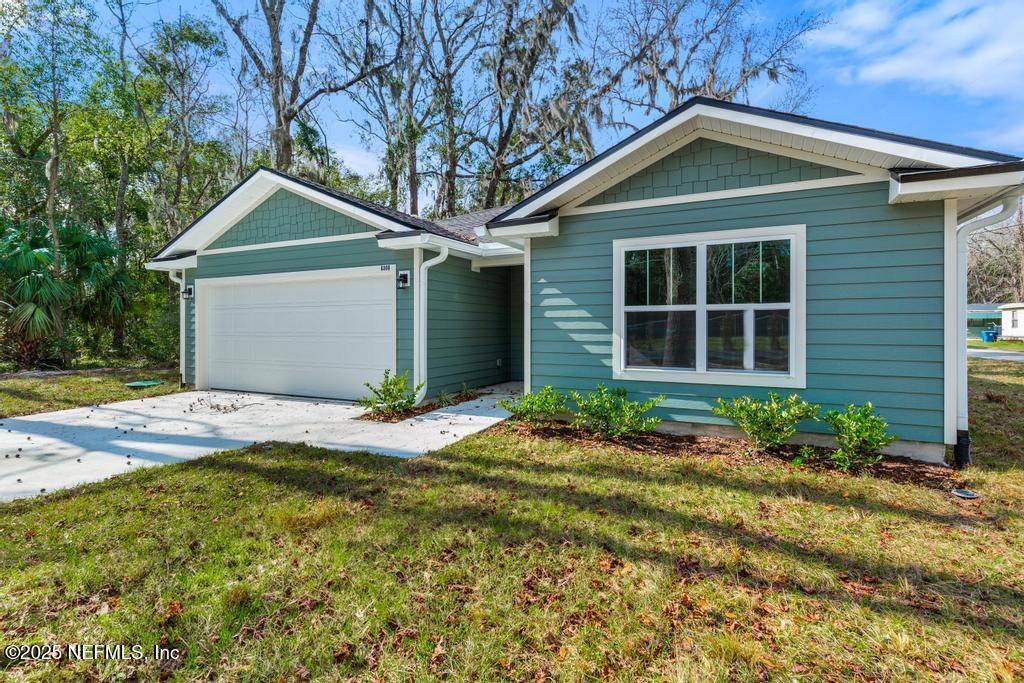 5958 Moncrief Road West Jacksonville, FL 32219 - Photo 2 of 27 2 Car Garage!
