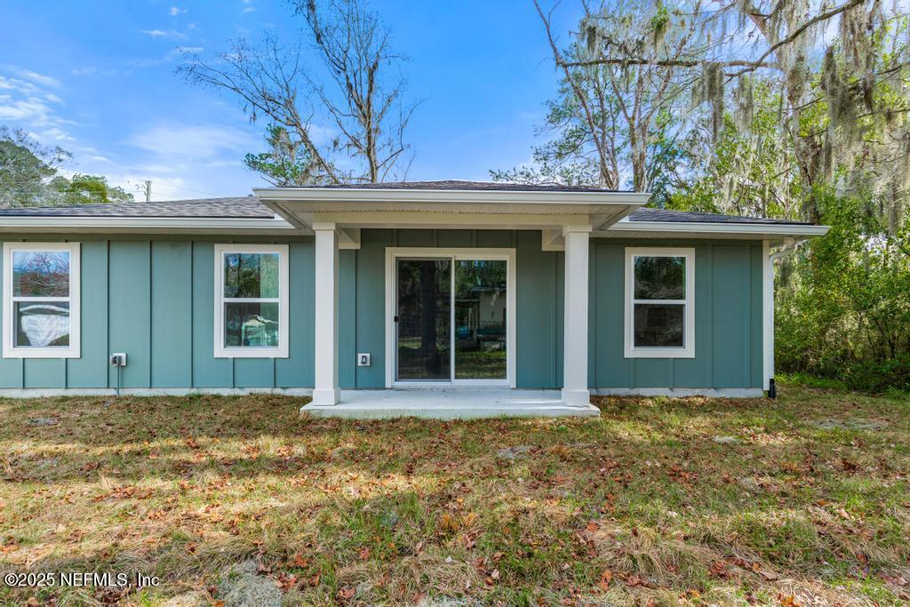 5958 Moncrief Road West Jacksonville, FL 32219 - Photo 3 of 27 Covered Back Porch