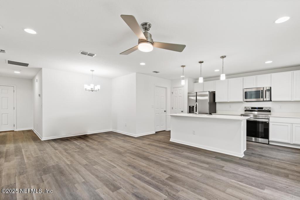 5958 Moncrief Road West Jacksonville, FL 32219 - Photo 4 of 27 White Cabinets