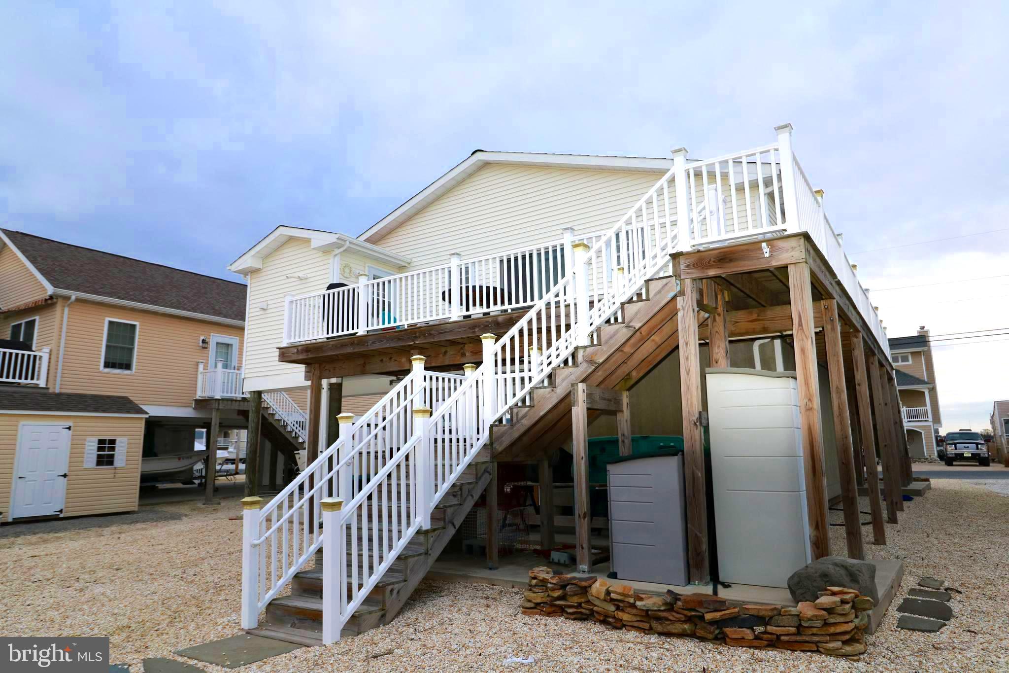 345 Kingfisher Road Tuckerton, NJ 08087 - Photo 3 of 40 Nice white vinyl railings.