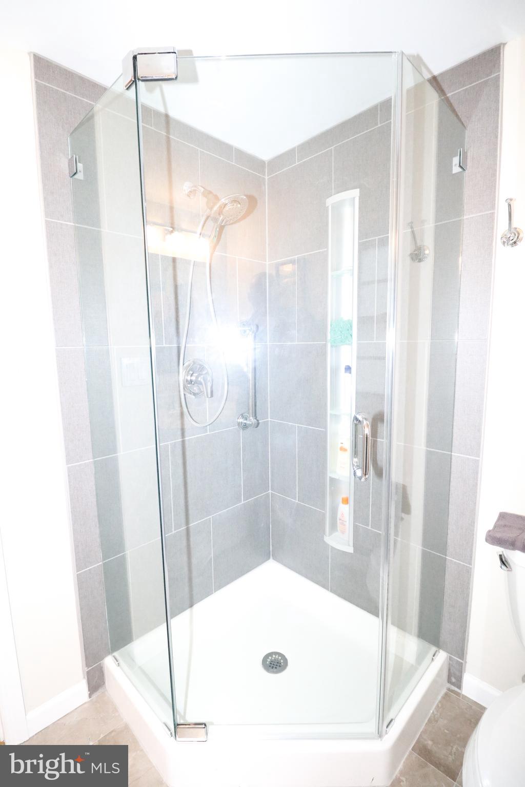 345 Kingfisher Road Tuckerton, NJ 08087 - Photo 27 of 40 Custom tile and glass shower enclosure.