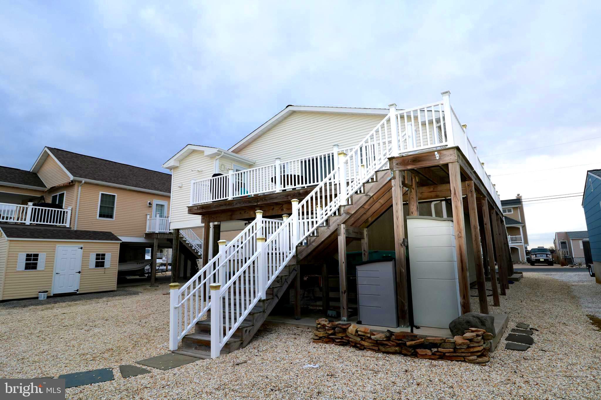 345 Kingfisher Road Tuckerton, NJ 08087 - Photo 4 of 40 Slate walkway to the water.