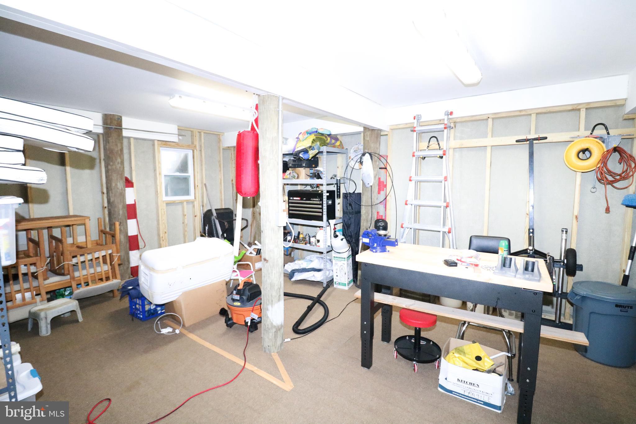 345 Kingfisher Road Tuckerton, NJ 08087 - Photo 34 of 40 Workshop/Storage room under house.