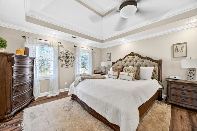 a bathroom with a bathtub a sink and a shower