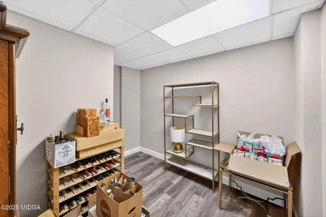 a view of a backyard with a large tree