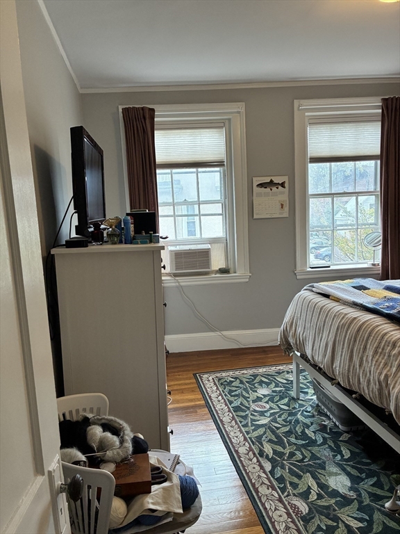 32 Shepard Street, Unit 24 Cambridge, MA 02138 - Photo 15 of 15 a bedroom with furniture and a window