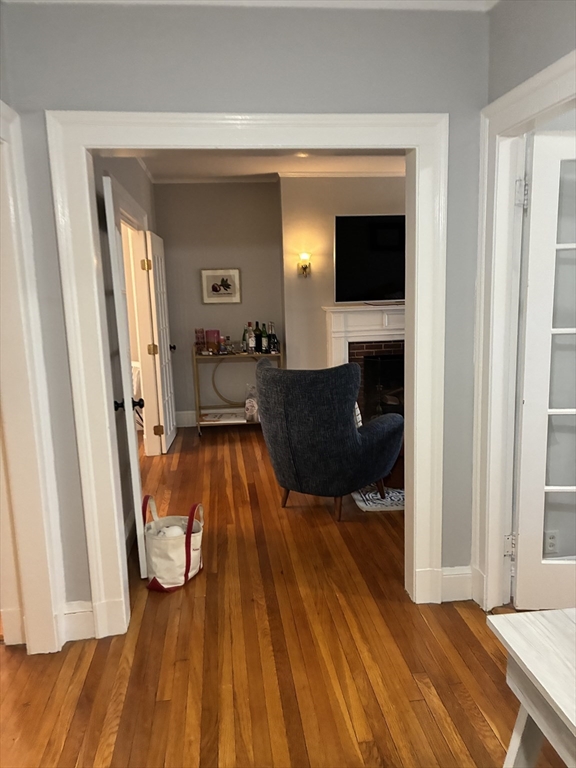 32 Shepard Street, Unit 24 Cambridge, MA 02138 - Photo 2 of 15 a view of living room with furniture and a flat screen tv