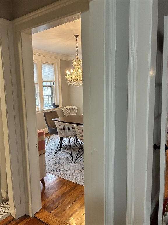 32 Shepard Street, Unit 24 Cambridge, MA 02138 - Photo 5 of 15 a workspace room with furniture and a mirror