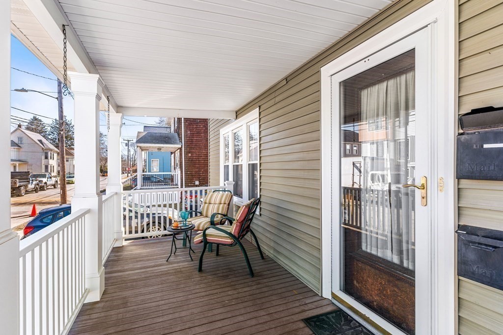 86 Howard Street, Unit 1 Waltham, MA 02451 - Photo 18 of 40 a view of a balcony with chair
