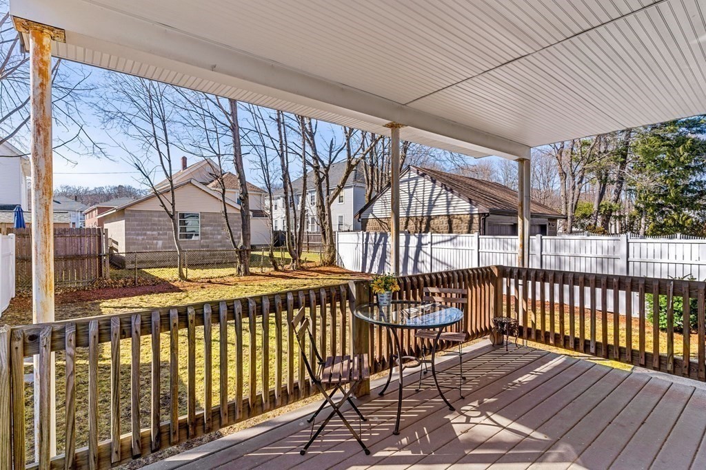 86 Howard Street, Unit 1 Waltham, MA 02451 - Photo 21 of 40 a view of a balcony with wooden floor