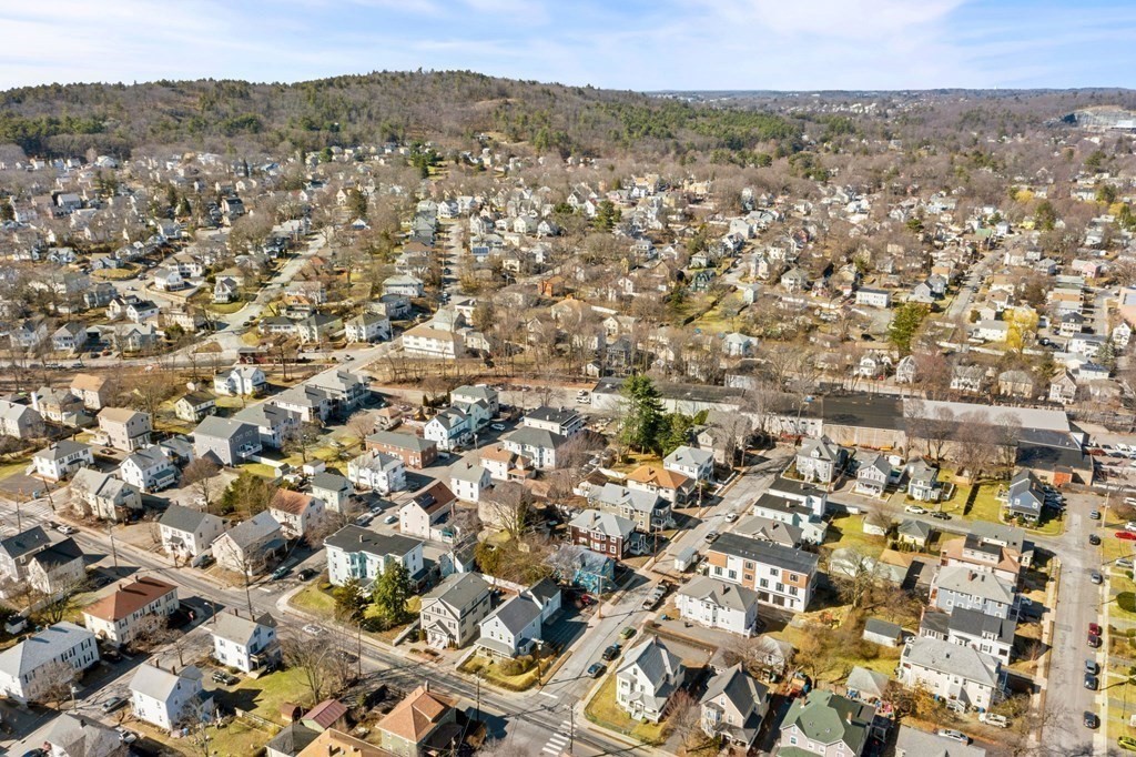86 Howard Street, Unit 1 Waltham, MA 02451 - Photo 40 of 40 an aerial view of residential houses with city view
