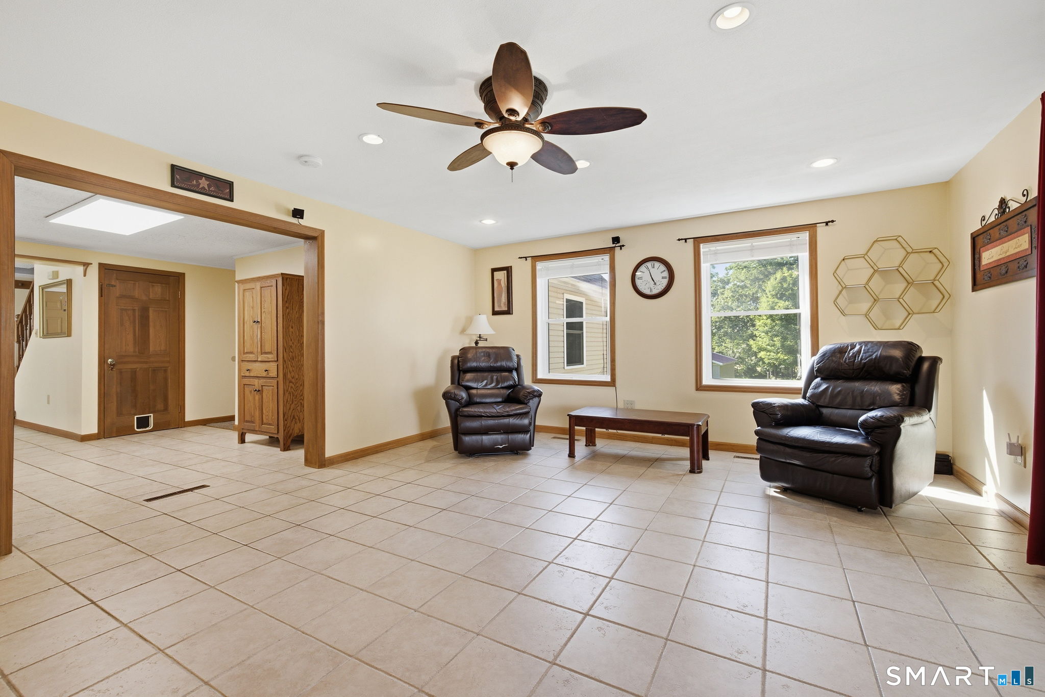 141 Hop River Road Coventry, CT 06238 - Photo 4 of 40 a living room with furniture and a large window