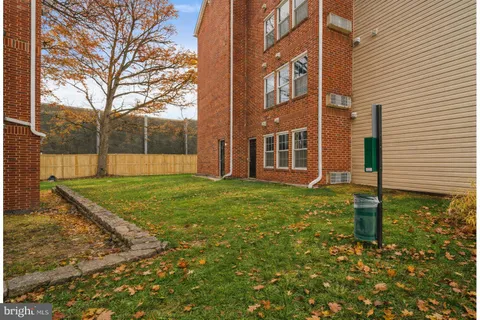 a view of a backyard with a garden