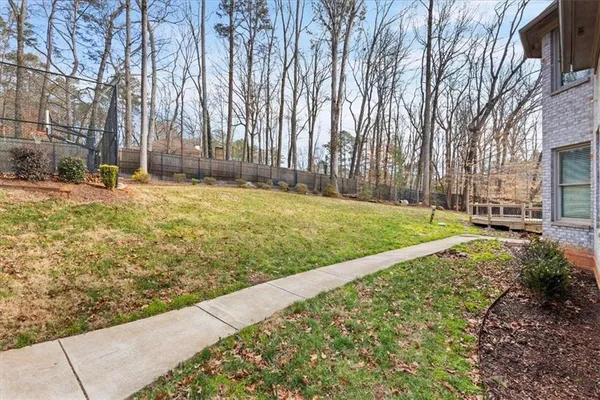 a view of an entryway with wooden floor and windows