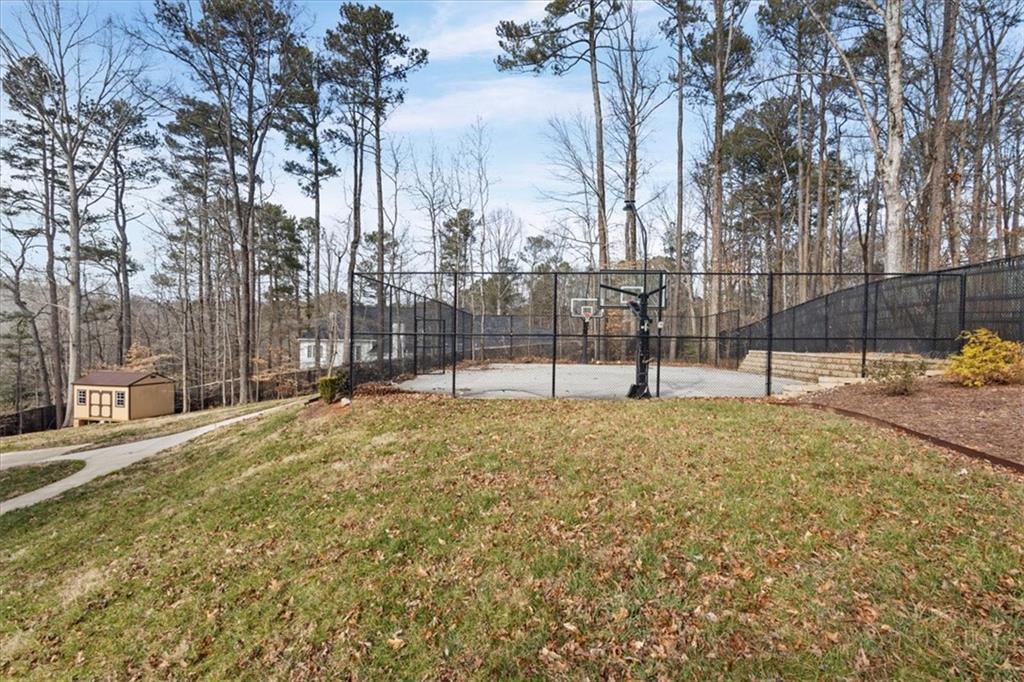 1859 Mountain Shadow Smoke Rise, GA 30087 - Photo 14 of 75 a view of a park with iron fence