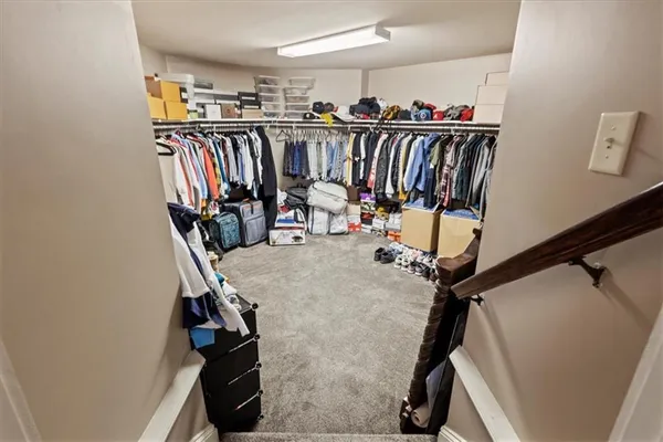 a kitchen with a stove sink and cabinets