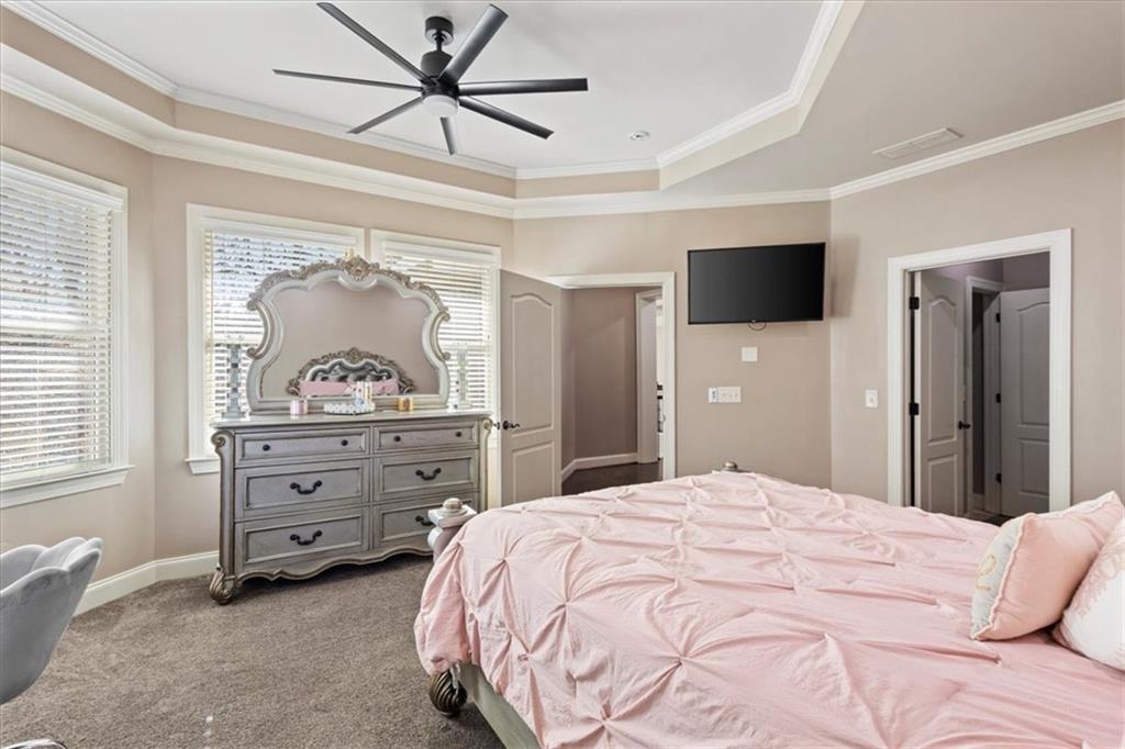 1859 Mountain Shadow Smoke Rise, GA 30087 - Photo 45 of 75 a bedroom with a bed and a dresser