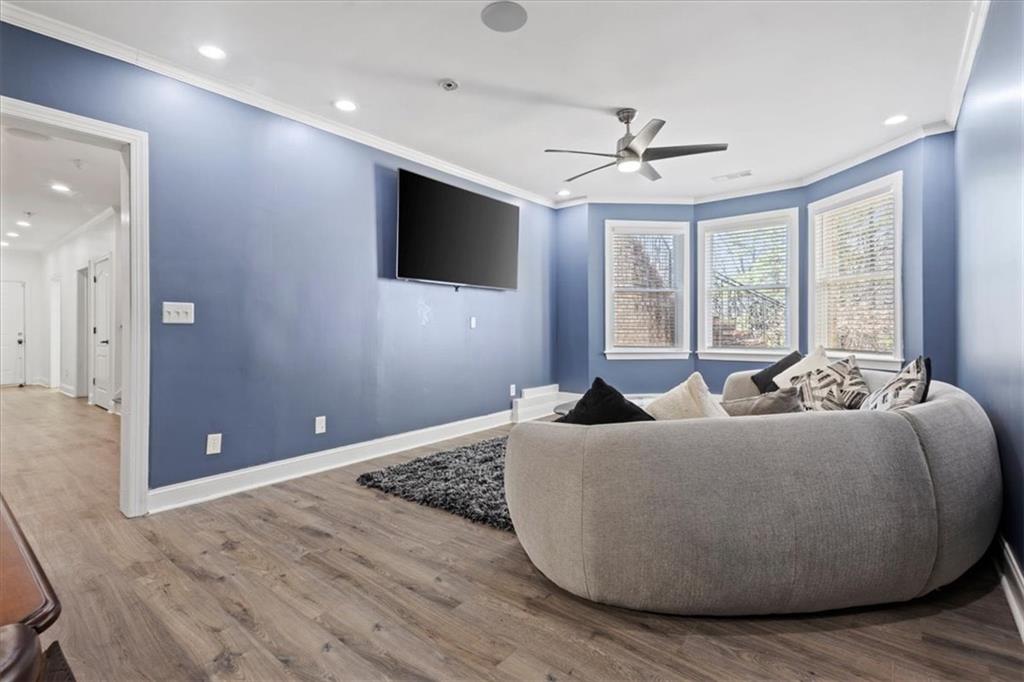 1859 Mountain Shadow Smoke Rise, GA 30087 - Photo 61 of 75 a living room with furniture and a flat screen tv