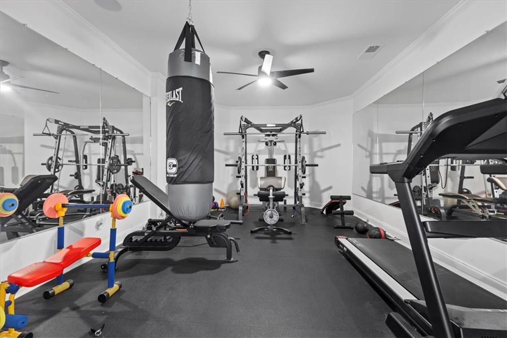 1859 Mountain Shadow Smoke Rise, GA 30087 - Photo 66 of 75 a view of a room with gym equipment