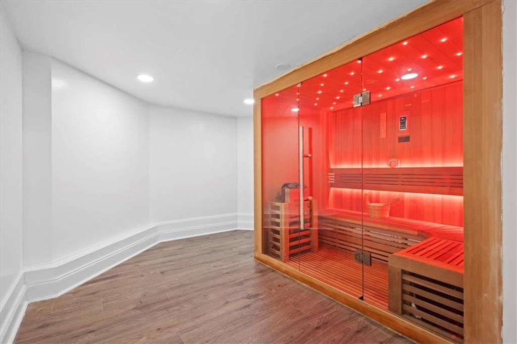 1859 Mountain Shadow Smoke Rise, GA 30087 - Photo 67 of 75 a view of an empty room with wooden floor and windows