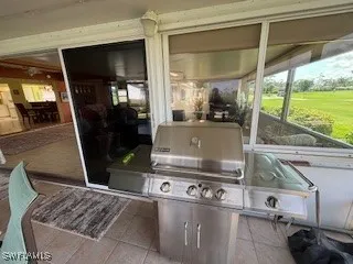 a room with water heater and wooden floor