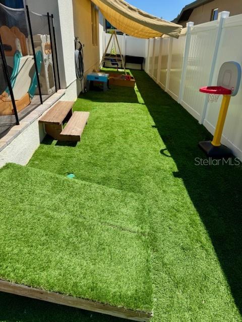 2075 Huntsman Rdg Road Clermont, FL 34715 - Photo 11 of 17 a view of yard with swimming pool