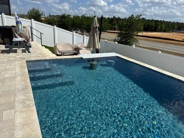 swimming pool view from a seating space