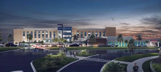 a view of swimming pool outdoor seating and city view