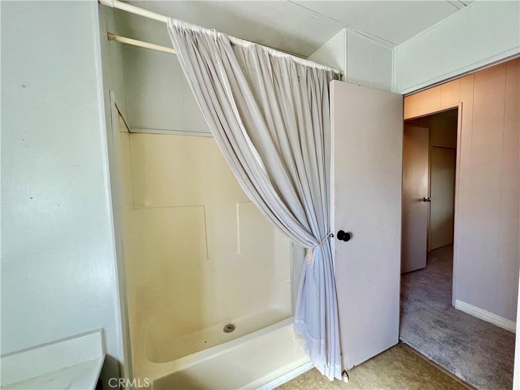 15181 Van Buren, Unit 10 Riverside, CA 92504 - Photo 21 of 29 Hall Bathroom