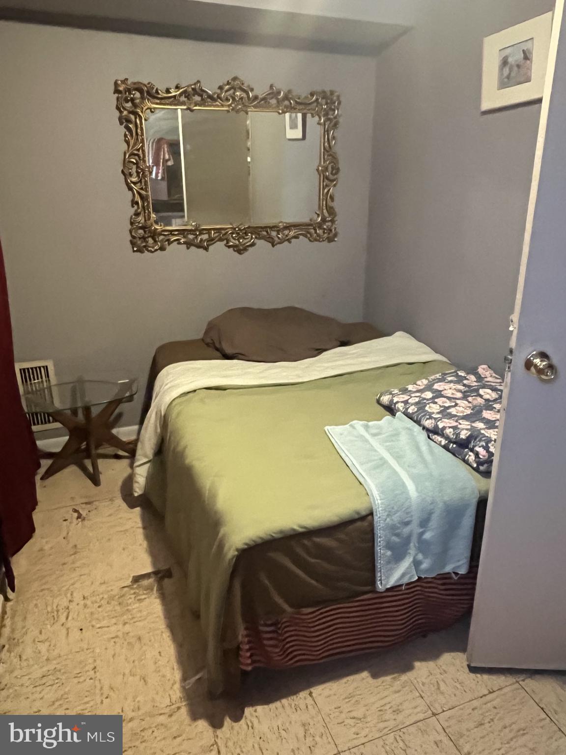 142 G Street Southwest, Unit 155 Washington, DC 20024 - Photo 13 of 13 a bedroom with a bed and cupboard