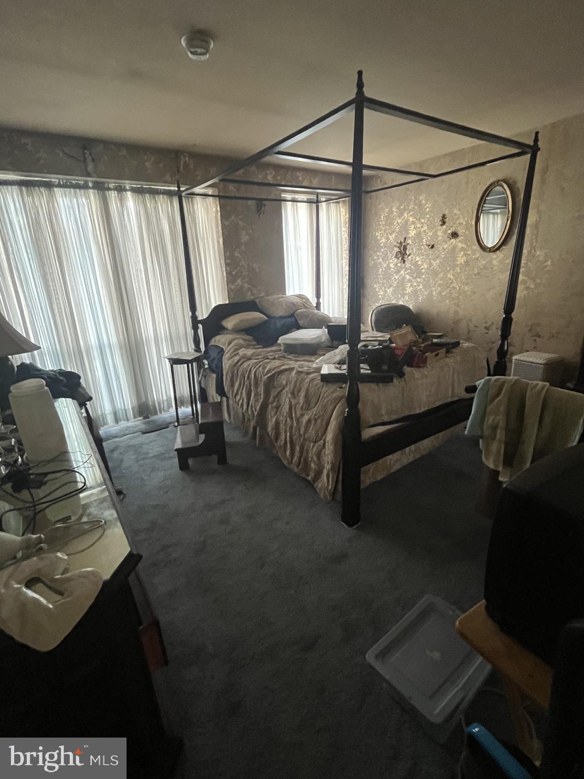 142 G Street Southwest, Unit 155 Washington, DC 20024 - Photo 10 of 13 a bed sitting in a room next to a window