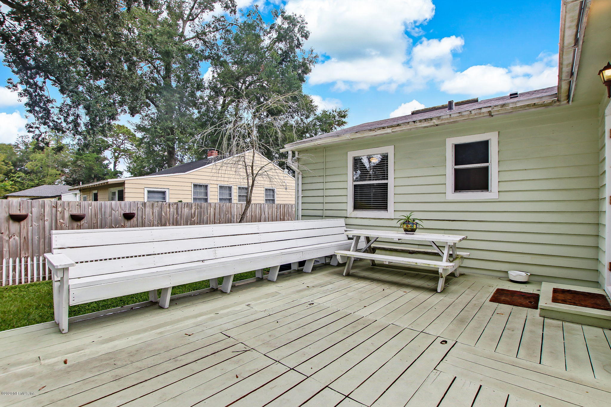 4637 Cambridge Road Jacksonville, FL 32210 - Photo 36 of 49 Deck with built-in seating