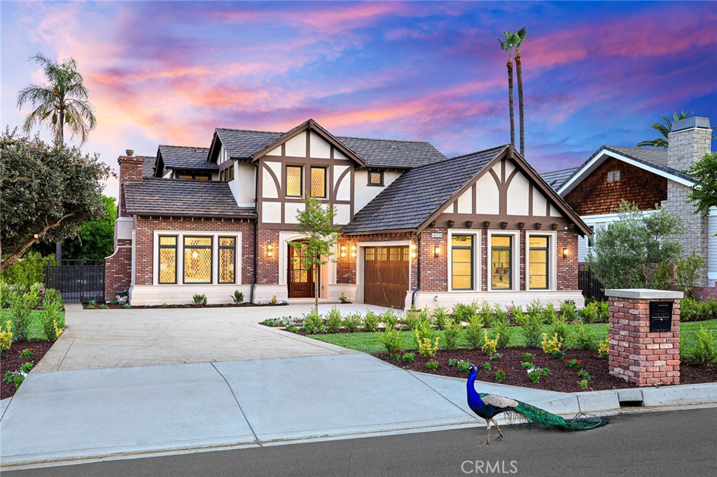 474 Harvard Drive Arcadia, CA 91007 - Photo 1 of 1 a front view of a house with a yard and potted plants