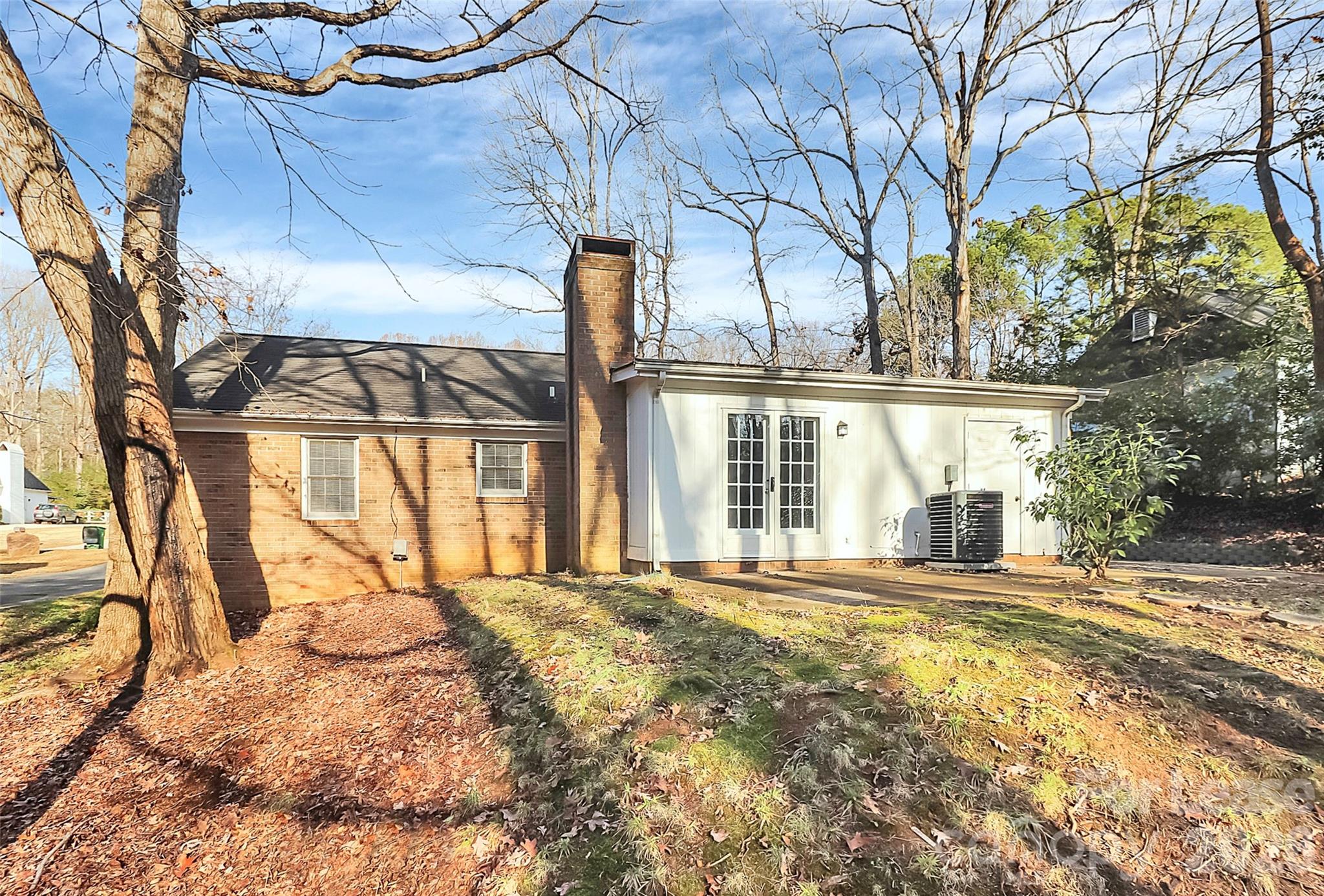 919 Pineborough Road Charlotte, NC 28212 - Photo 18 of 19 a view of a house with a yard and sitting area