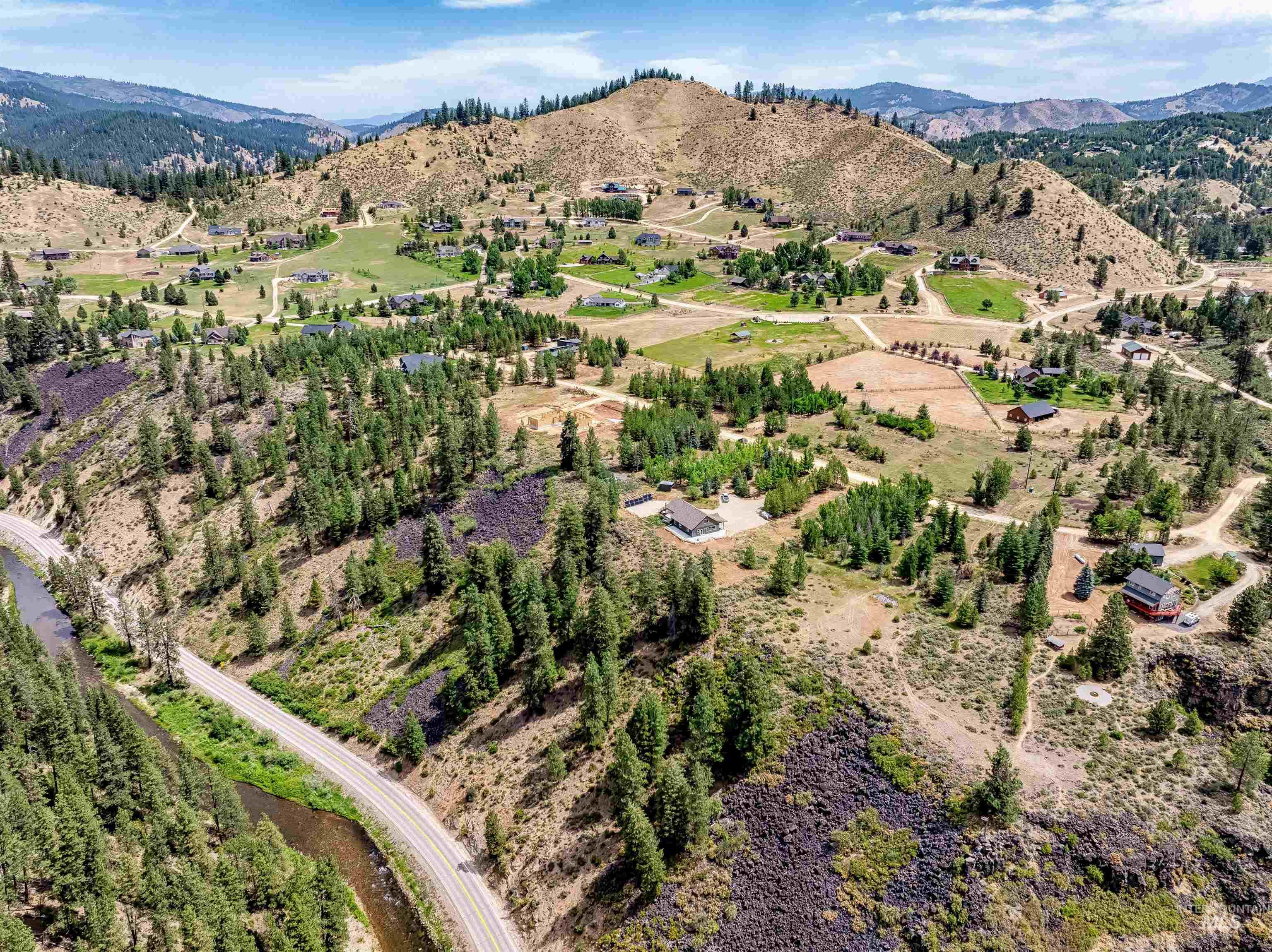 Lot 16 Corral Flat Boise, ID 83716 - Photo 13 of 17 Aerial overview of property's location featuring a mountainous background