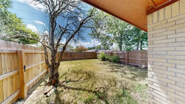 a view of backyard of house