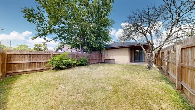 a view of swimming pool with sitting area