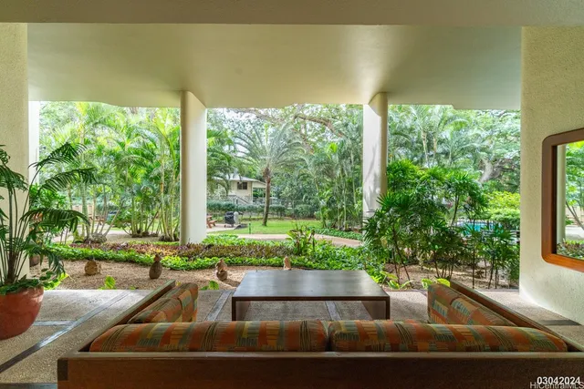 a view of swimming pool from a balcony