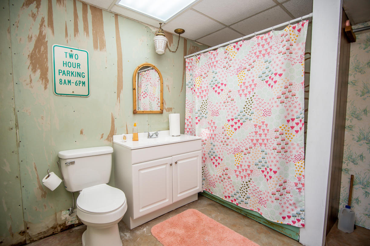 4155 Hardy Road Hardy, VA 24101 - Photo 50 of 61 a bathroom with a sink toilet and shower curtain