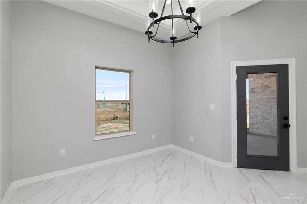 1614 Arden Street Mercedes, TX 78570 - Photo 6 of 17 a view of an empty room with a window