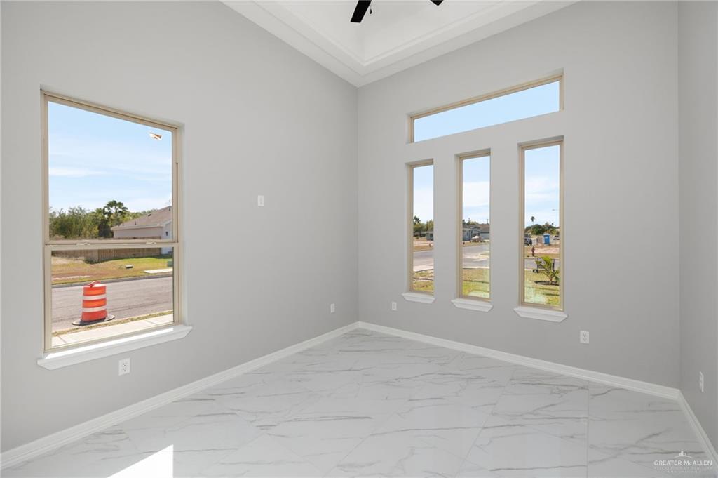1614 Arden Street Mercedes, TX 78570 - Photo 10 of 17 a view of an empty room with a window