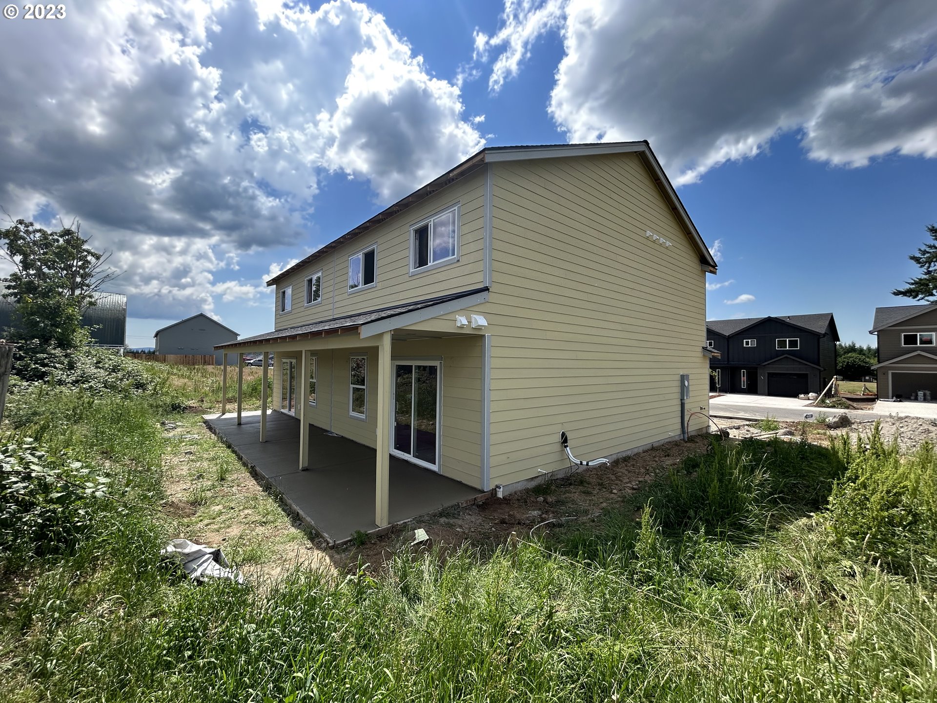 1006 Peach Road Winlock, WA 98596 - Photo 5 of 15 a front view of a house with a yard