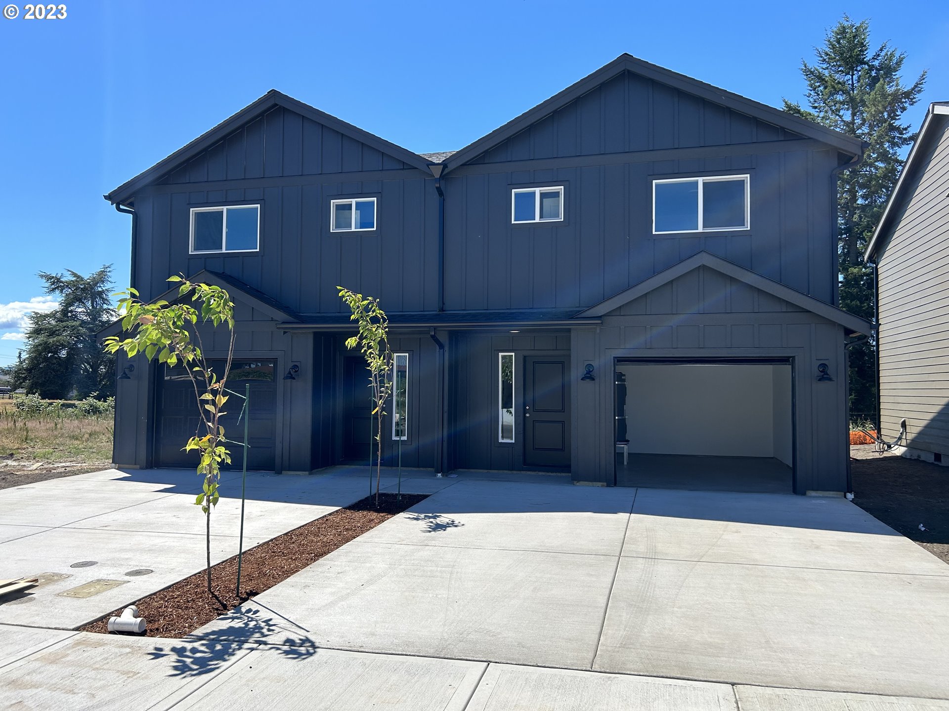 1006 Peach Road Winlock, WA 98596 - Photo 6 of 15 a front view of a house with a yard