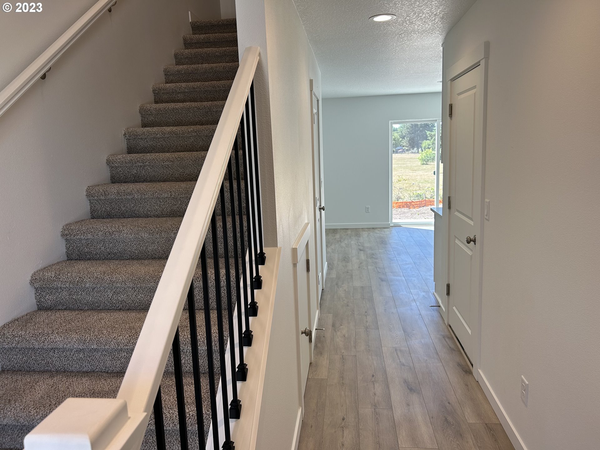 1006 Peach Road Winlock, WA 98596 - Photo 9 of 15 a view of entryway and hall with wooden floor