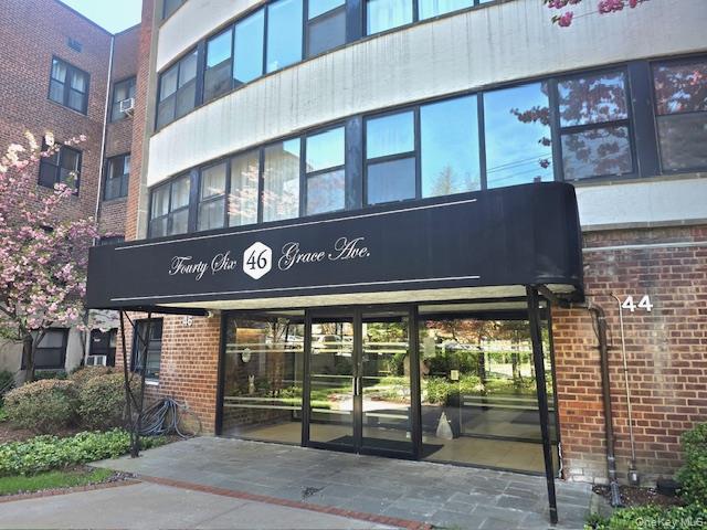 46 Grace Avenue, Unit 2J Great Neck, NY 11021 - Photo 1 of 20 a front view of a building