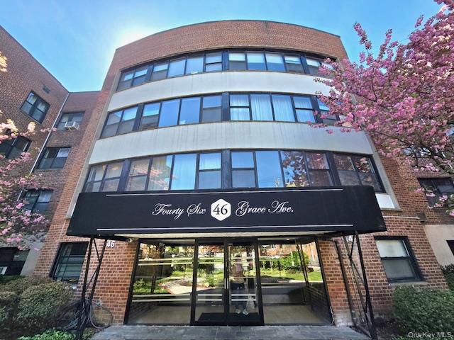 46 Grace Avenue, Unit 2J Great Neck, NY 11021 - Photo 2 of 20 a front view of a building